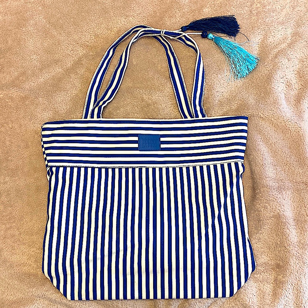 Obagi bag with blue and white stripes.